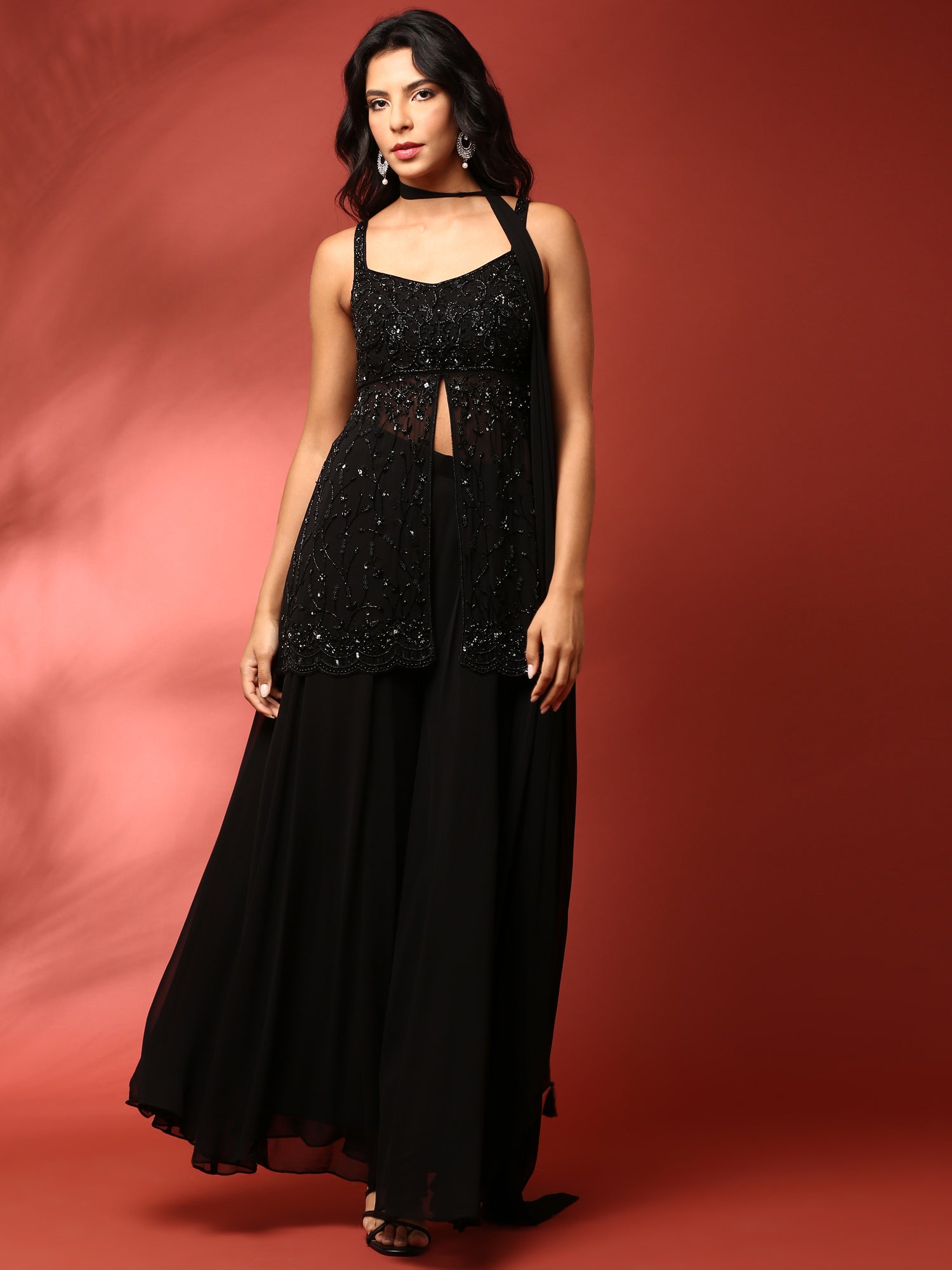 Black heavy hand embroidered peplum top with palazoo set