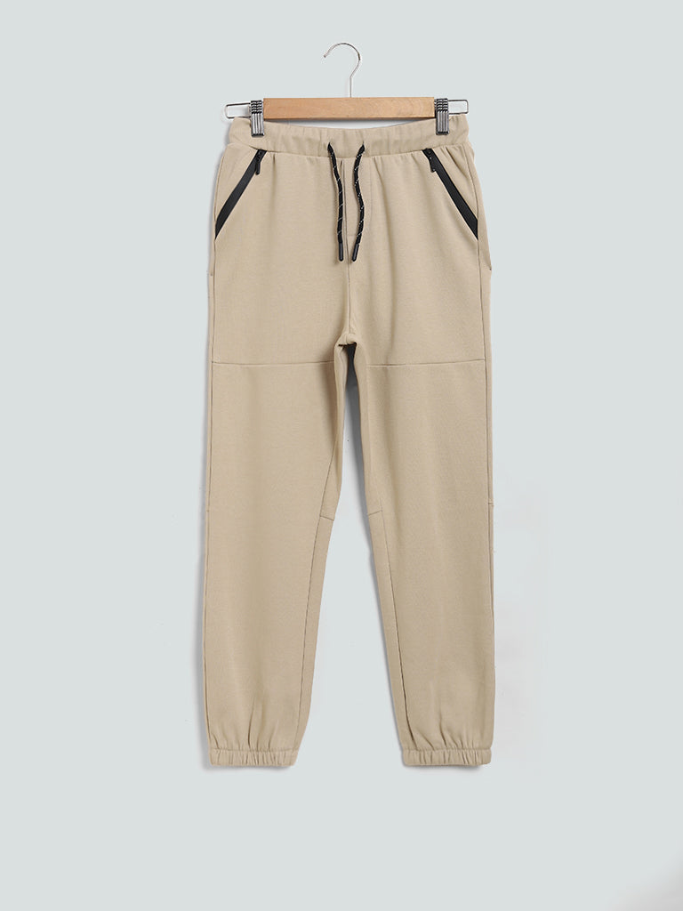 Y&F Kids Beige Solid Eagle Joggers