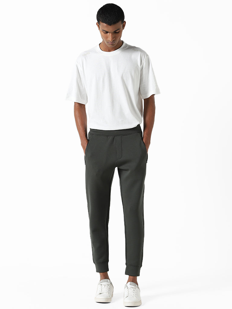 Buy Studiofit Solid Beige Slim Fit Joggers from Westside