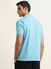 WES Casuals Blue Solid Relaxed Fit Polo T-Shirt