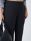 Gia Black Pinstriped Bootcut High-Rise Trousers
