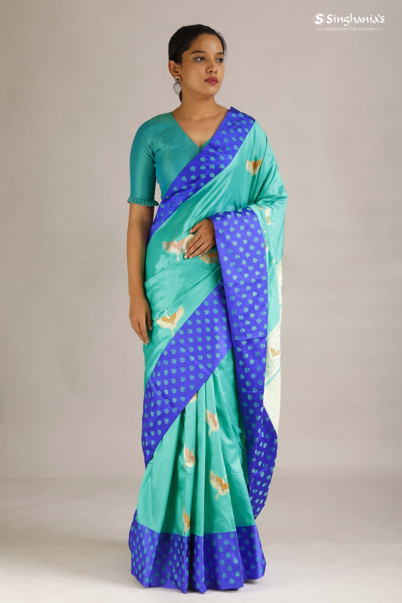 Turquoise Blue Banarasi Silk Saree With Bird Motifs