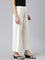 Women Solid Cream Mid Rise Ribbed Palazzos