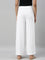 Women Solid White Viscose Mid Rise Knit Palazzos