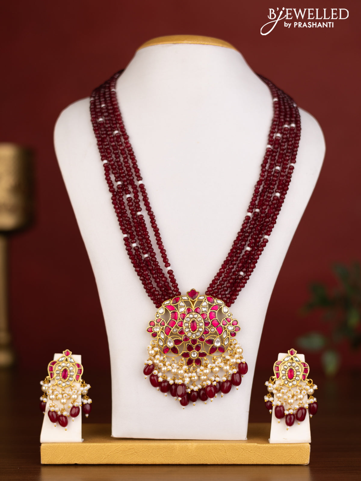 Beaded multilayer maroon haaram with pink jadau kundan stones and natural beads & pearl hangings