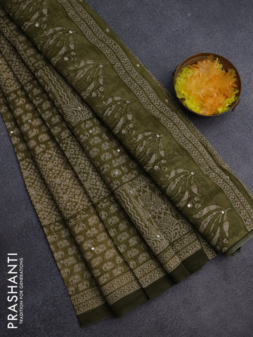 Chanderi silk cotton saree mehendi green and beige with allover prints & mirror work and printed border