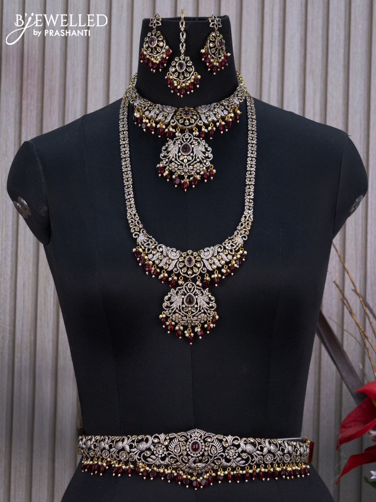Bridal set peacock design with ruby & cz stones and beads hangings in victorian finish