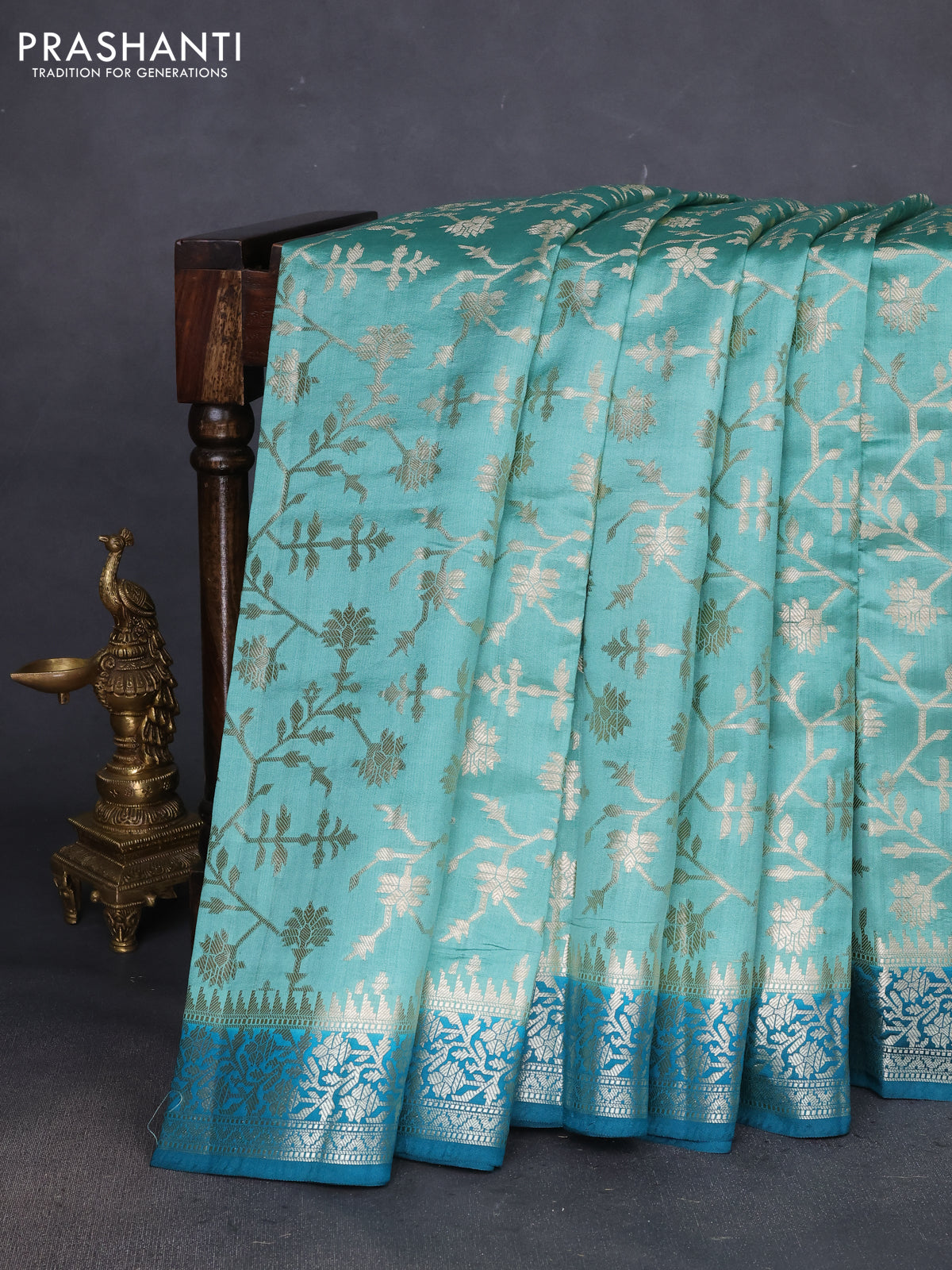 Chiniya silk saree pastel green and peacock green with allover zari weaves and zari woven border