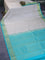 Pure kanchipuram silk saree pastel grey and teal blue with zari woven buttas and zari woven border