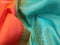 Pure kanchipuram silk saree dual shade of pinkish orange and teal blue with zari woven buttas and zari woven border