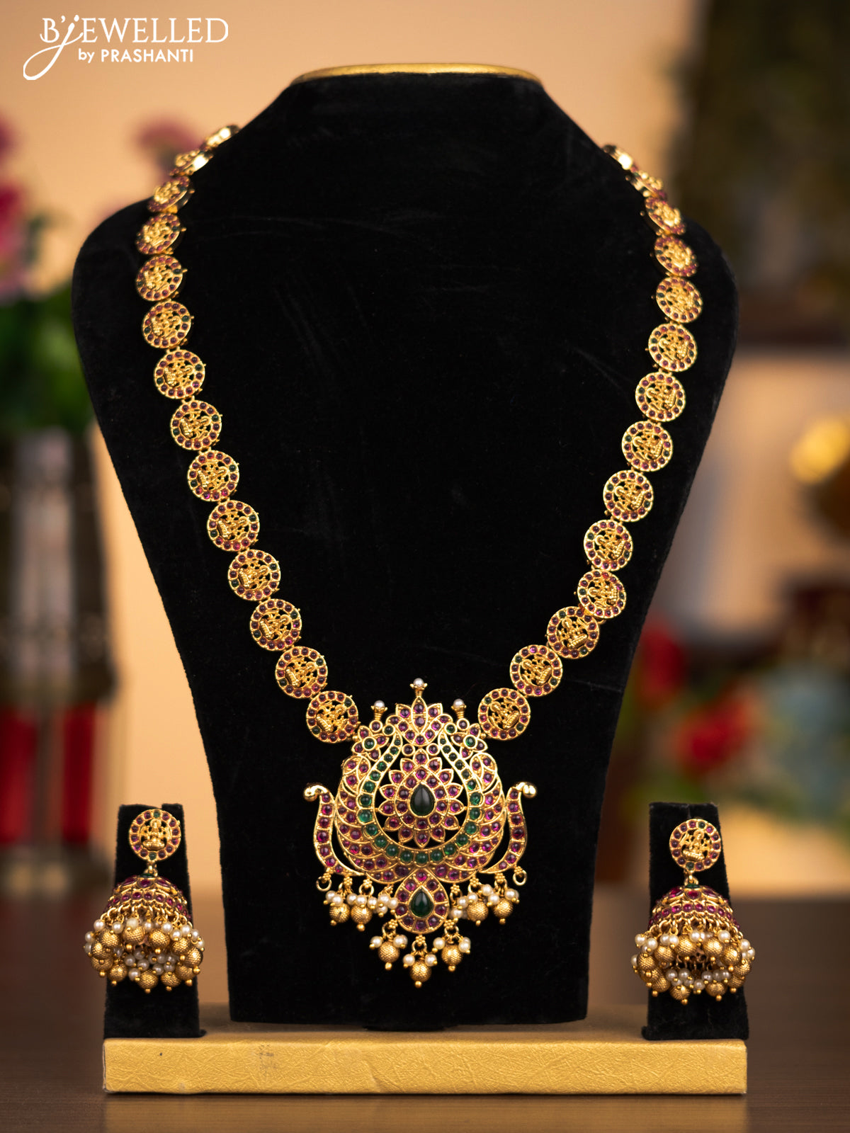 Antique haaram lakshmi design with kemp stones and pearl & golden beads hanging