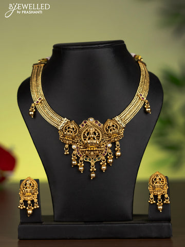 Antique attigai necklace lakshmi pendant with kemp & kundan stones and golden beads hanging