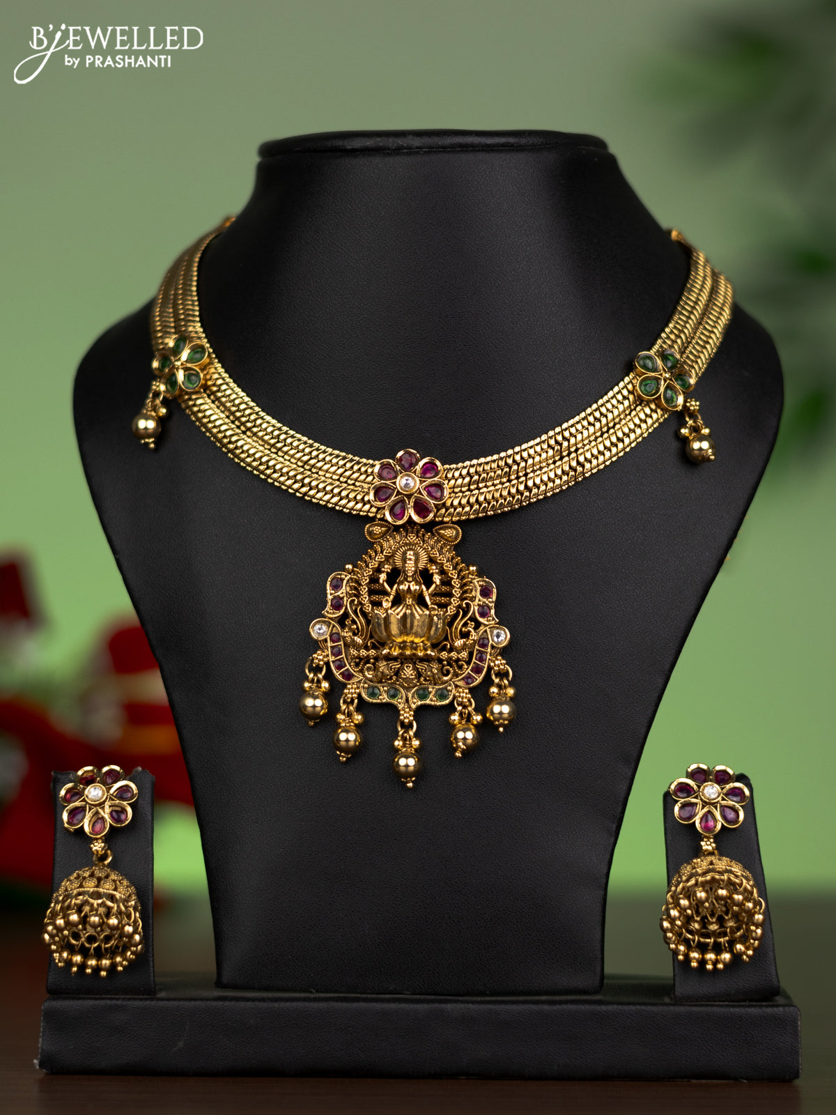 Antique attigai necklace lakshmi design with kemp & cz stones and golden beads hangings