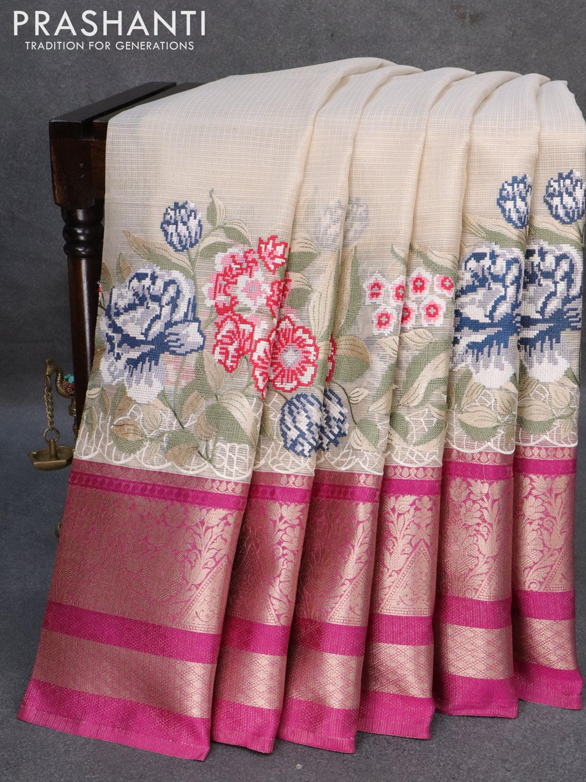 Banarasi kota tissue saree off white and purple with floral design embroidery work and long zari woven border