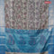 Banarasi semi tussar saree grey and cs blue with allover ikat weaves and silver zari woven border