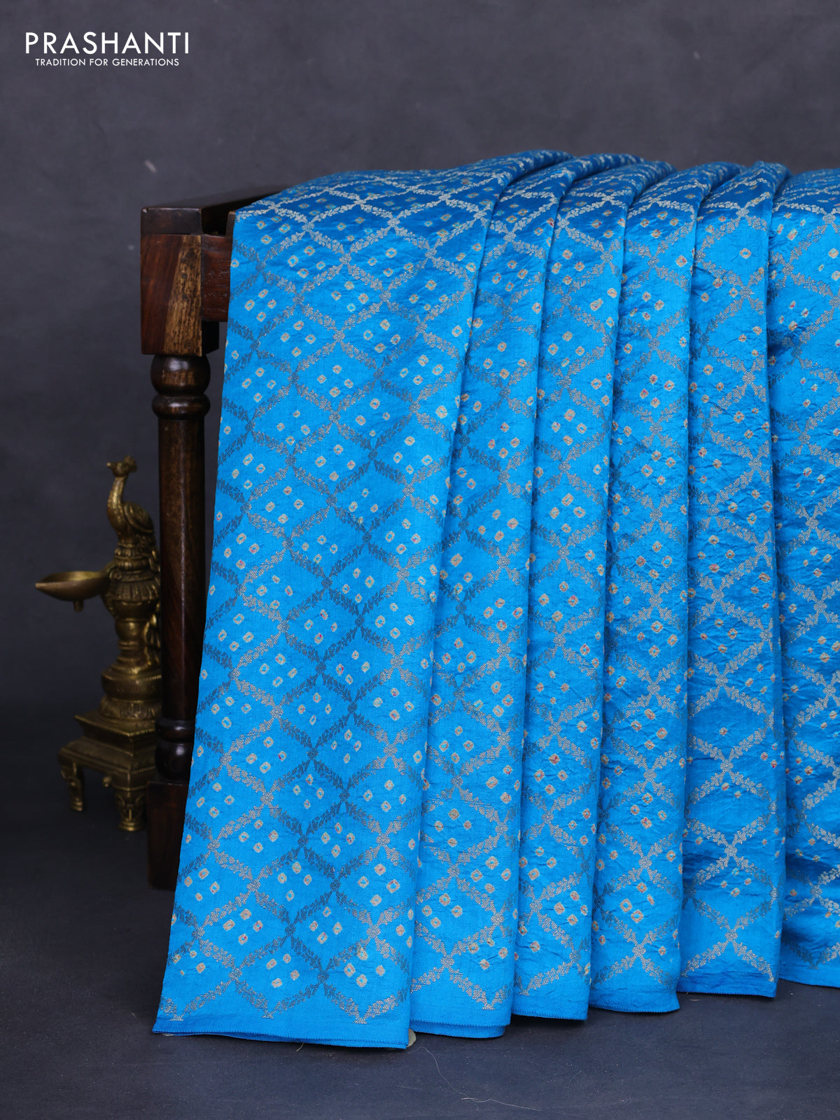 Chiniya silk saree cs blue with allover zari weaves & bandhini prints and zari woven border