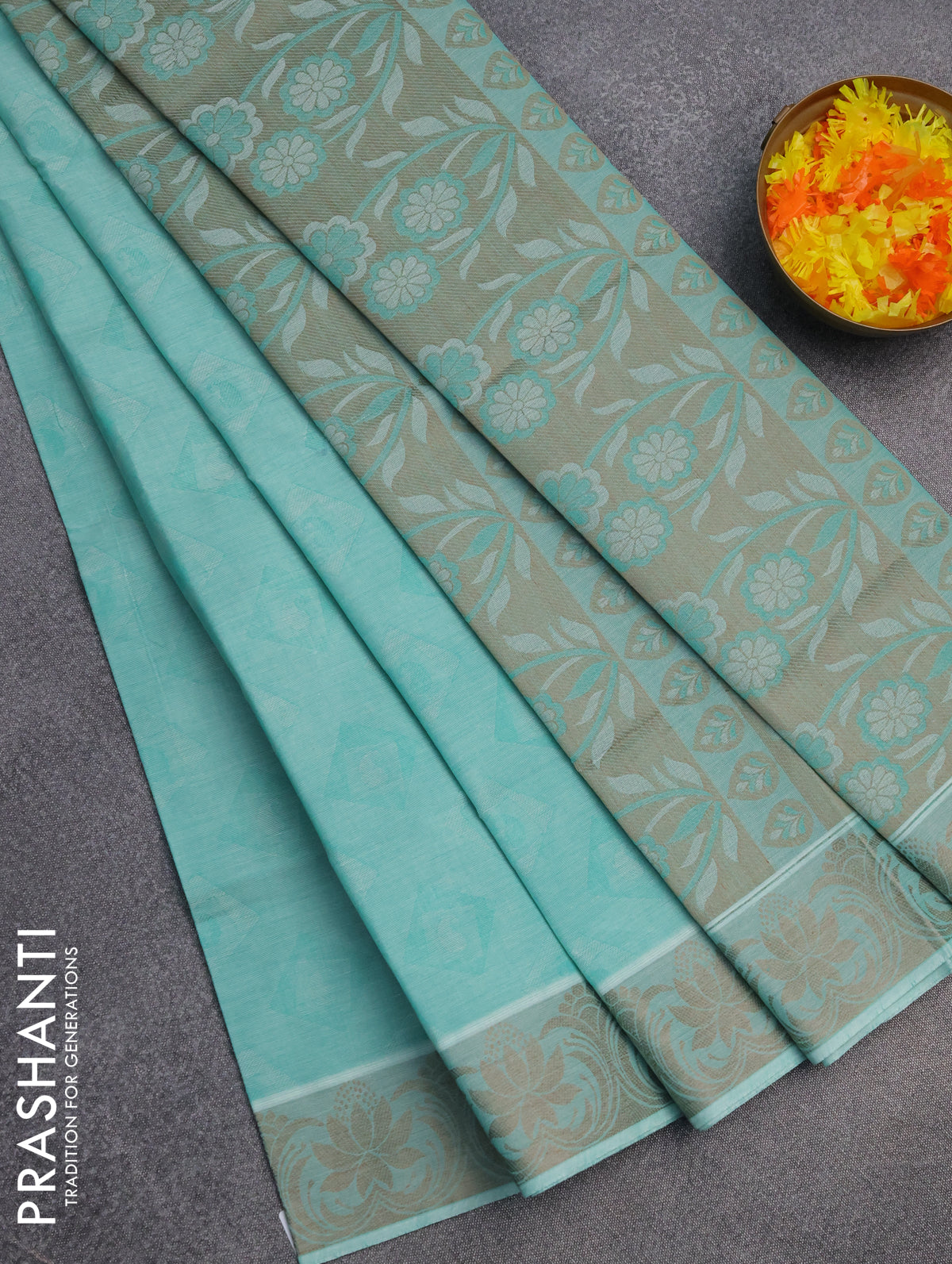 Coimbatore cotton saree mild teal green and beige with allover self emboss and thread woven border
