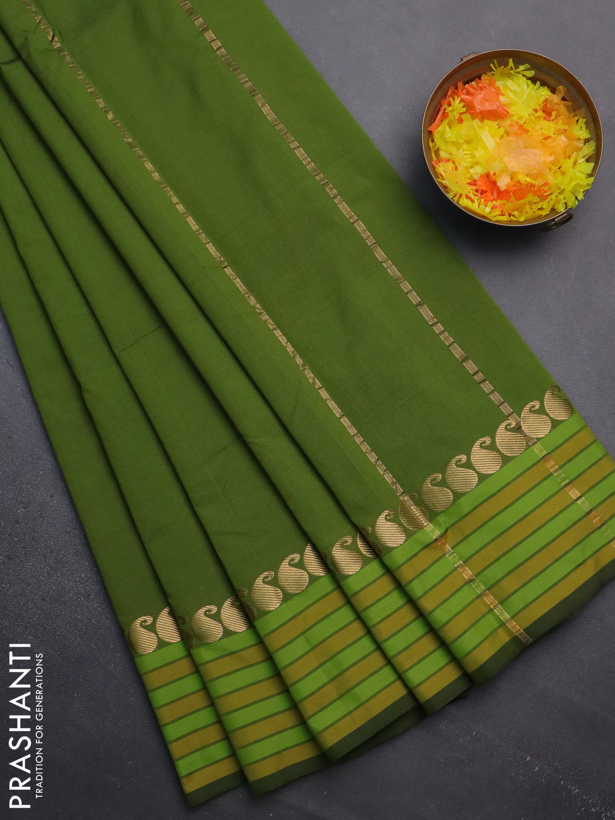 Arani semi silk saree sap green and mustard yellow with plain body and paisley zari woven simple border