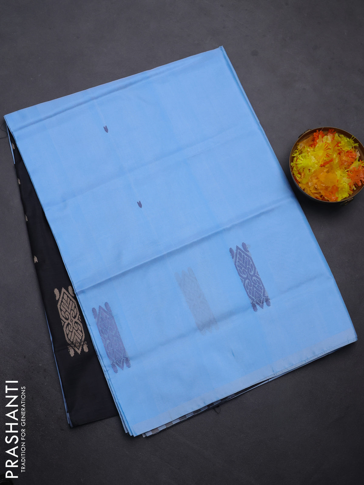 Banana pith saree light blue and black with thread woven buttas in borderless style