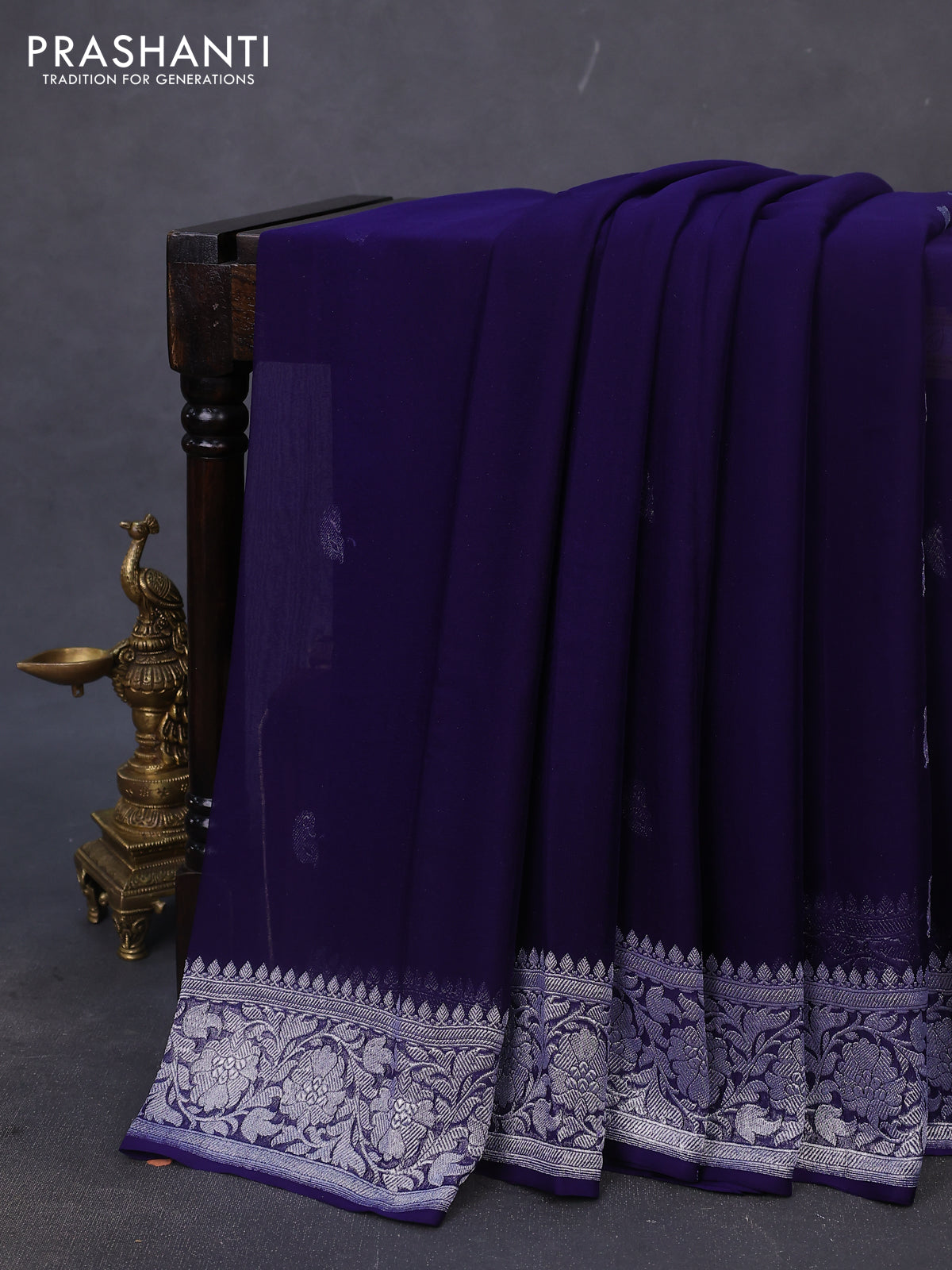 Banarasi chiffon silk saree navy blue with paisley silver zari woven buttas and floral silver zari woven border