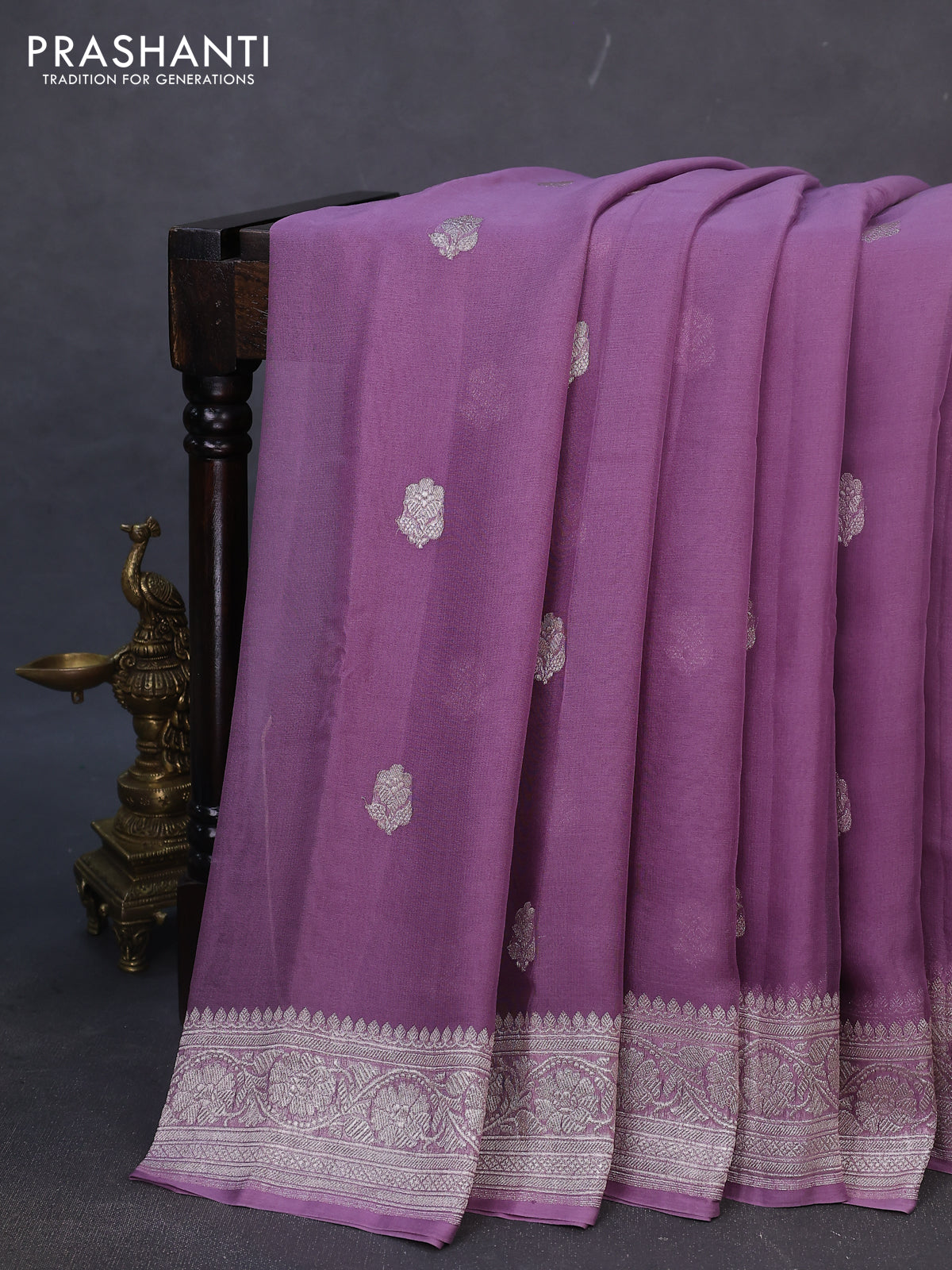 Banarasi chiffon silk saree pastel purple with silver zari woven buttas and silver zari woven border
