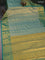 Kanchipuram tissue silk saree dual shade of teal green with allover zari woven brocade weaves and long rich zari woven border