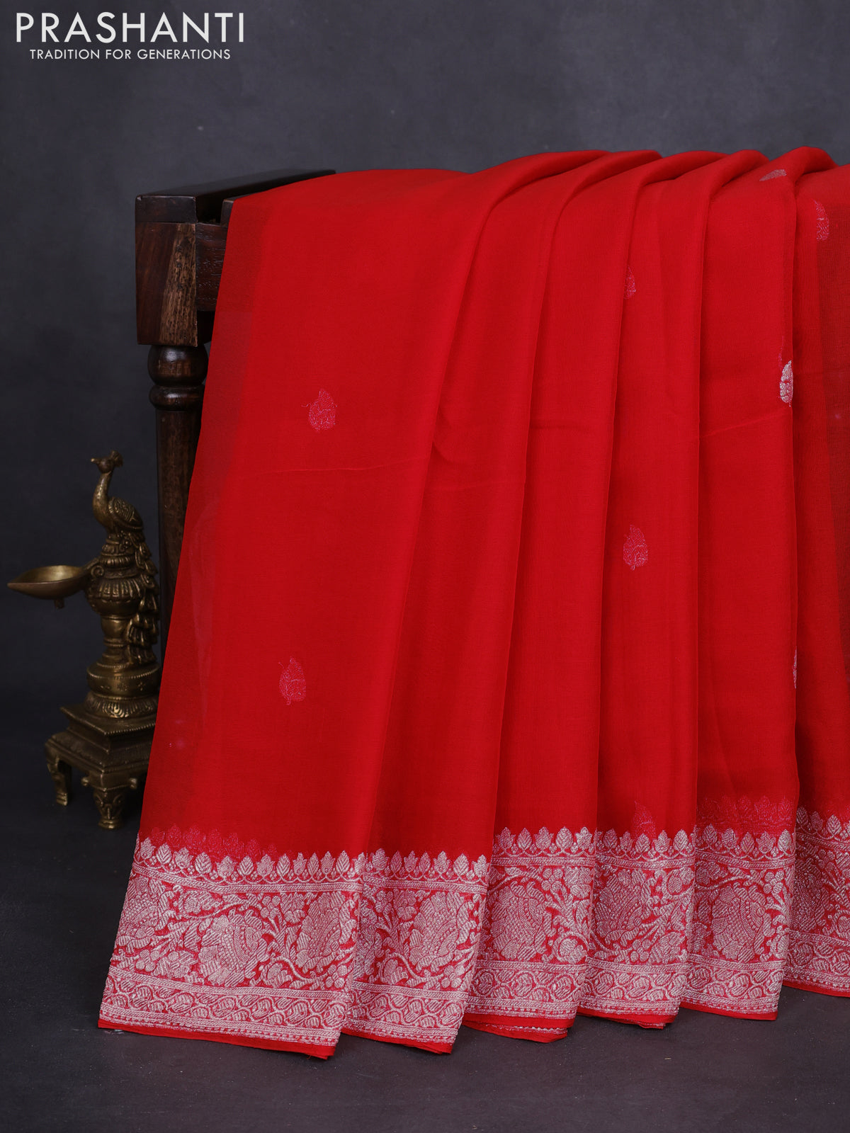 Banarasi chiffon silk saree orange with silver zari woven buttas and floral silver zari woven border