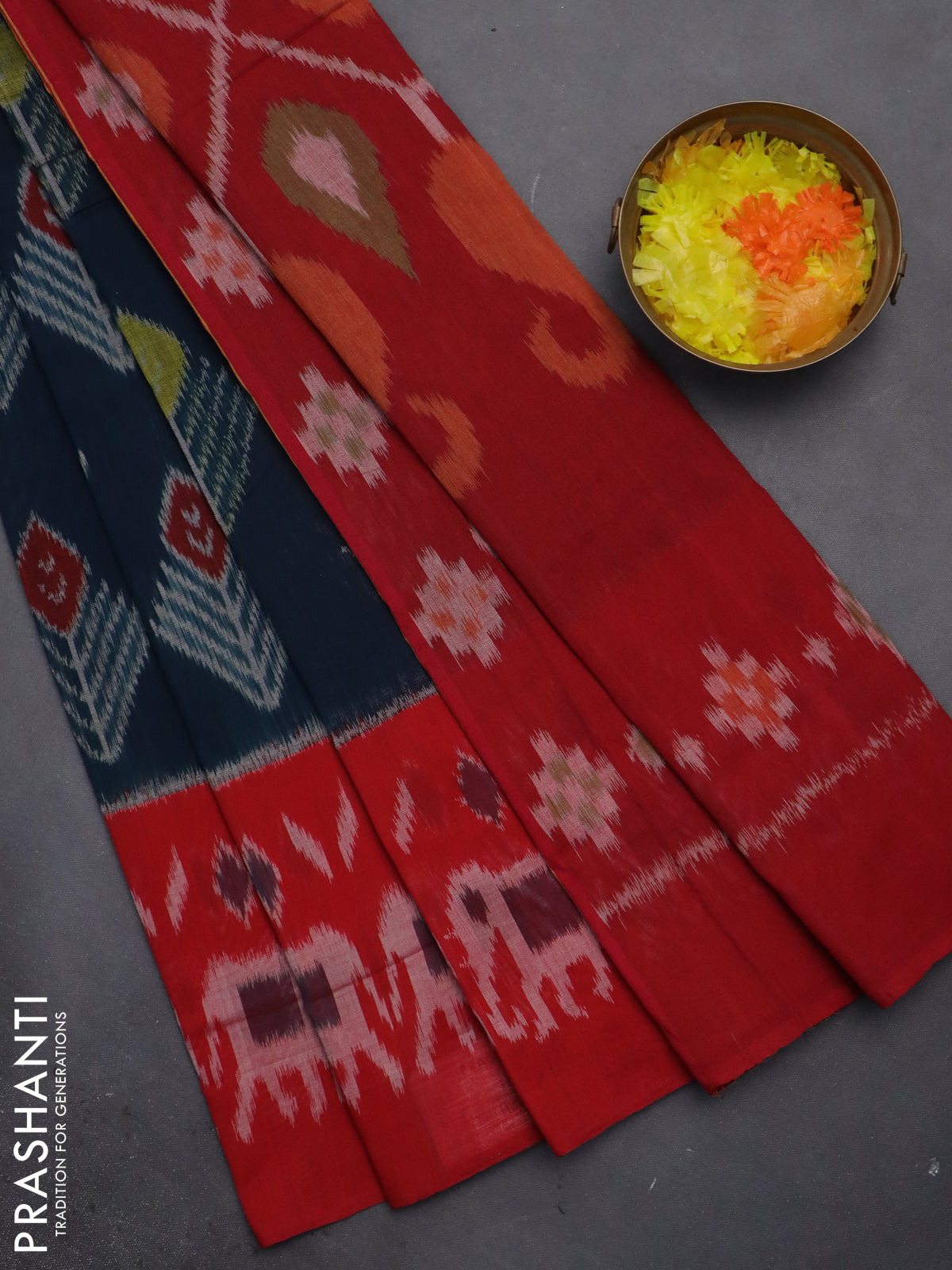 Ikat cotton saree peacock blue and red with allover ikat butta weaves and long ikat style border