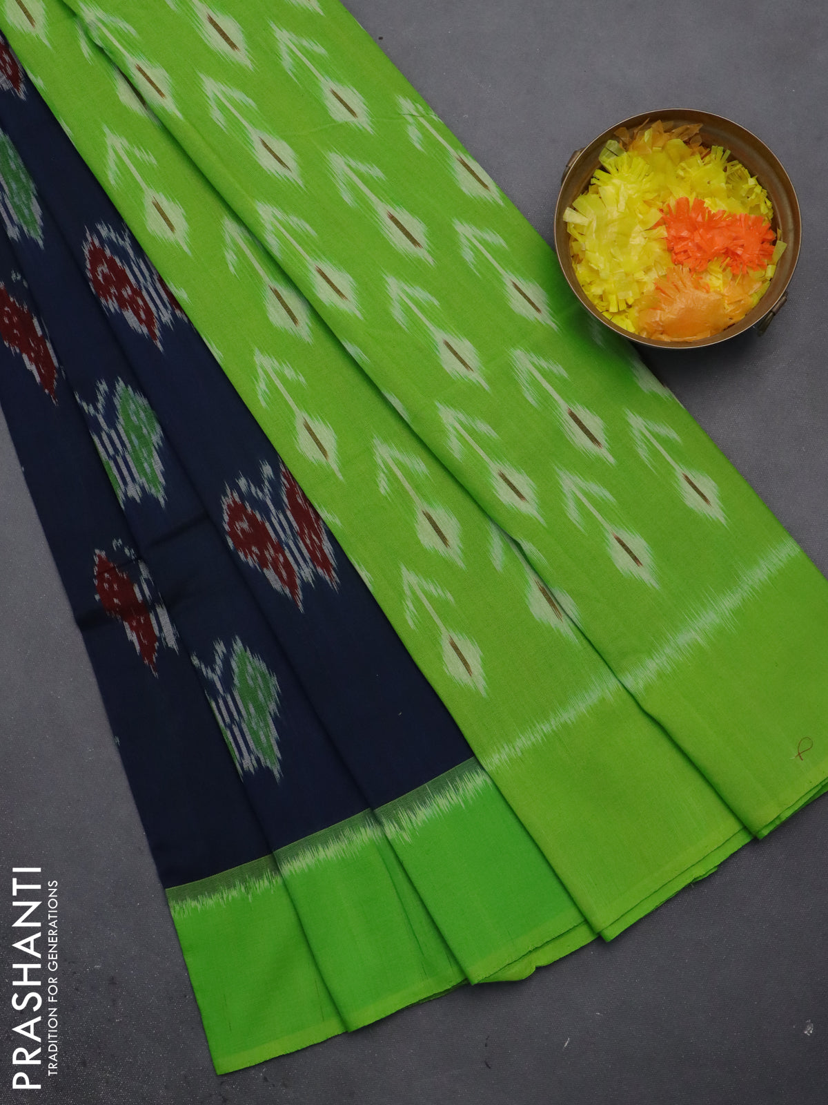 Ikat cotton saree peacock blue and light green with allover ikat butta weaves and long ikat style border