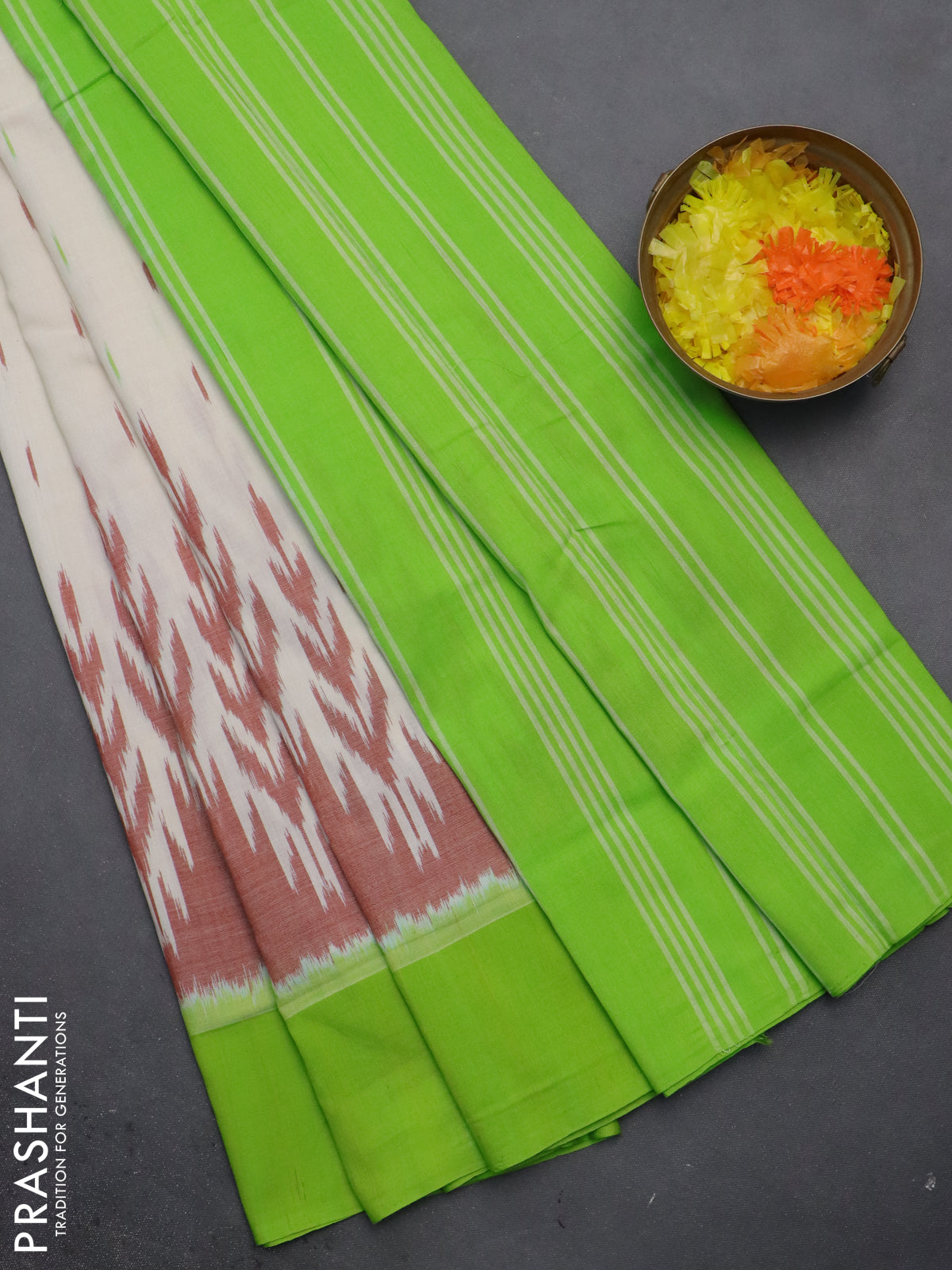 Ikat cotton saree off white and light green with allover ikat butta weaves and temple design simple border