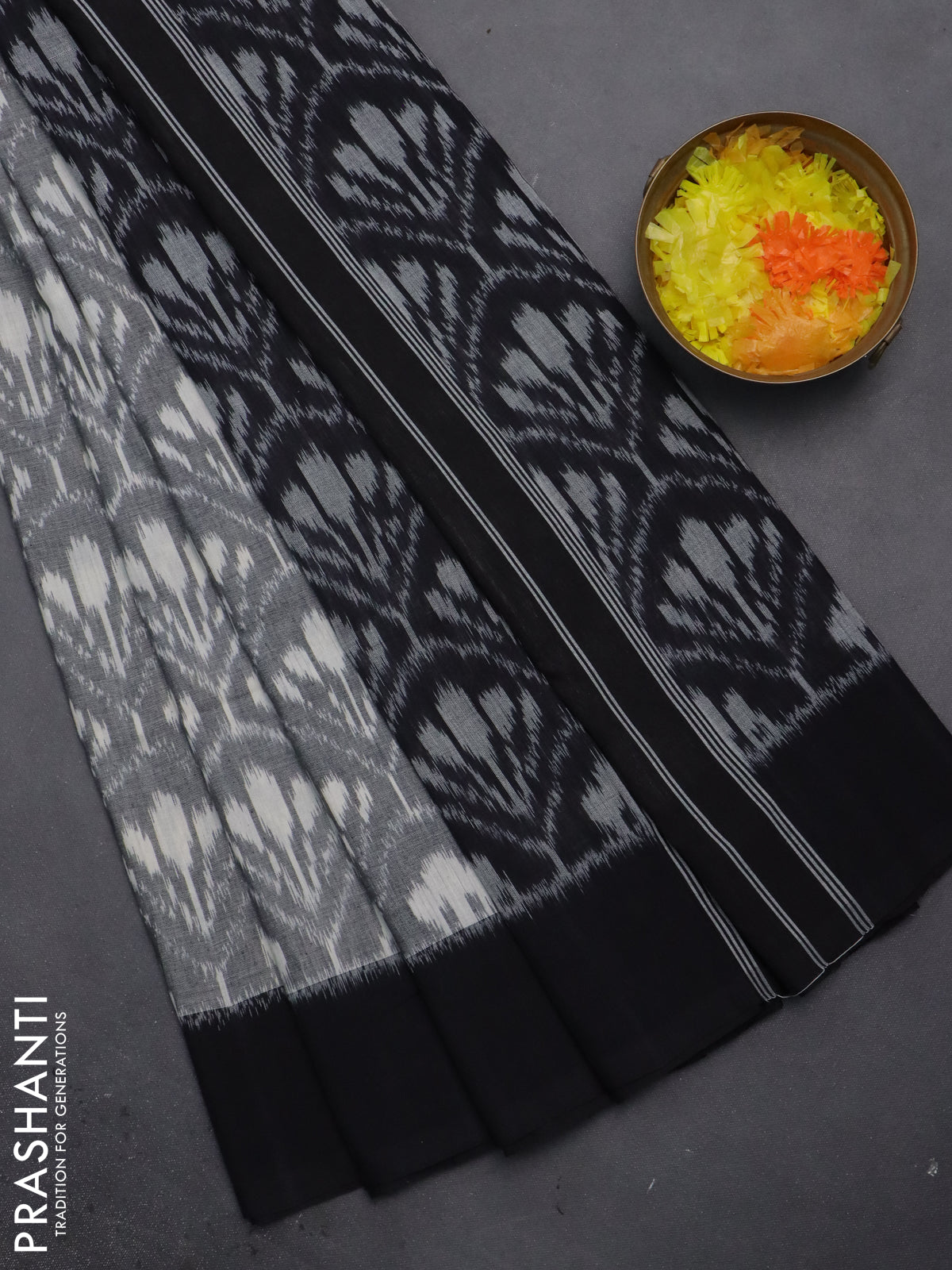 Ikat cotton saree grey and black with allover ikat weaves and simple border