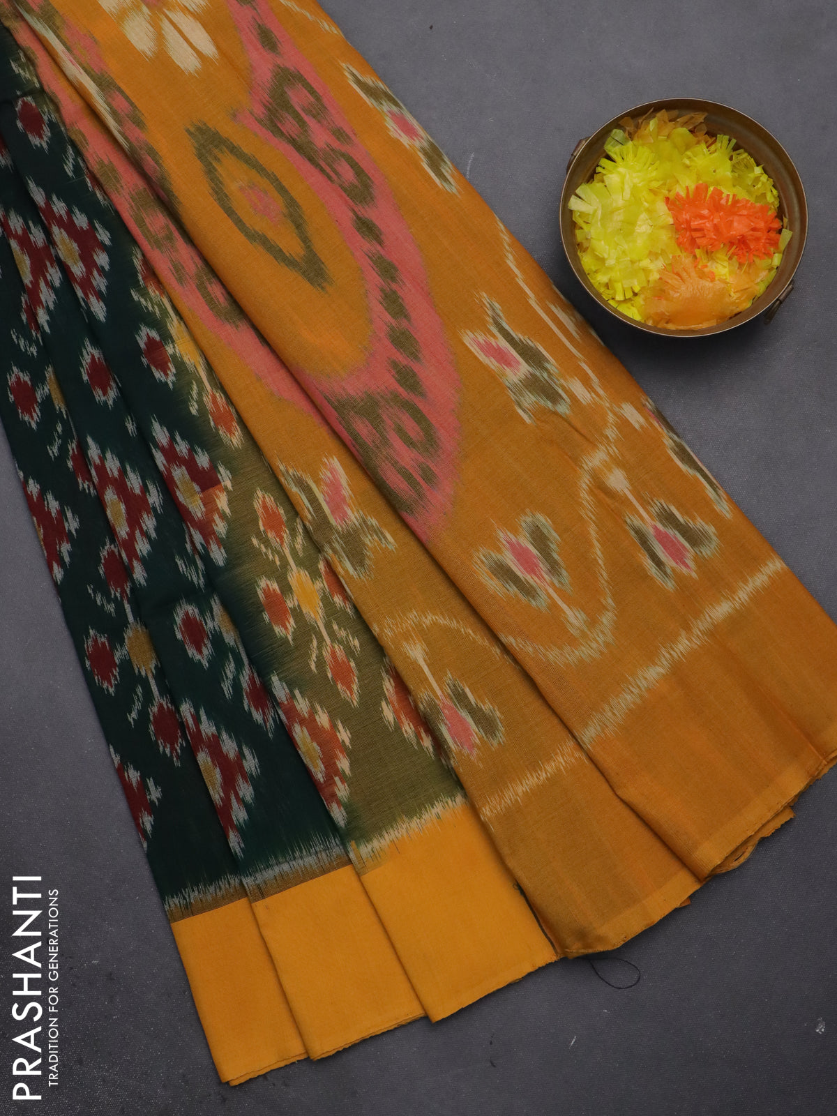 Ikat cotton saree bottle green and mango yellow with allover ikat butta weaves and long ikat style border
