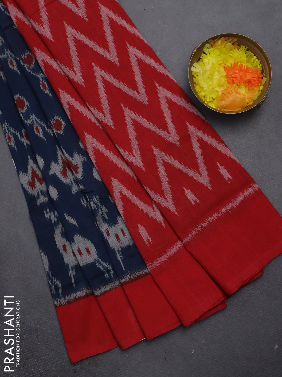 Ikat cotton saree peacock blue and red with allover ikat weaves and simple border