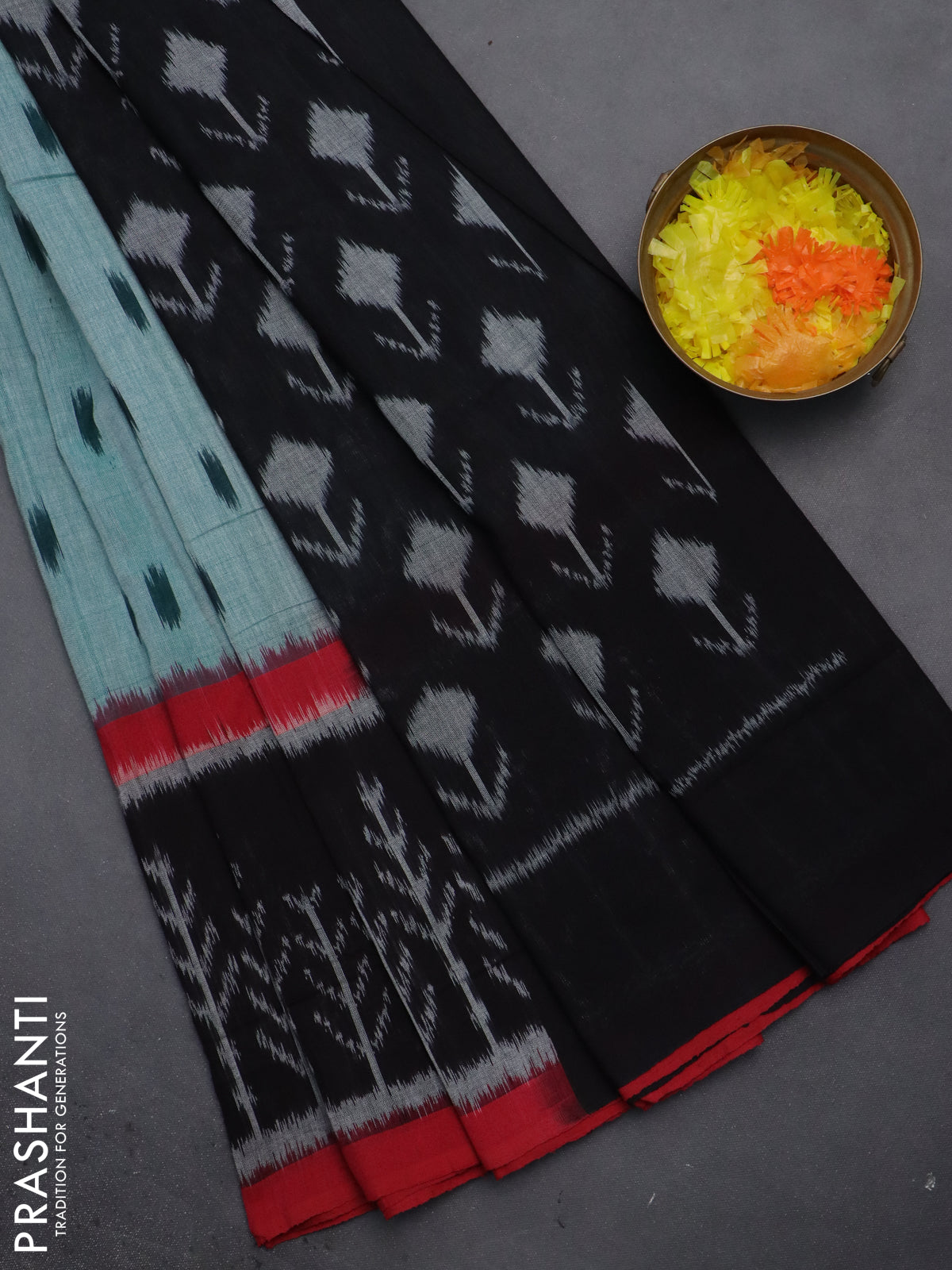 Ikat cotton saree green and black red with allover ikat butta weaves and long ikat style border