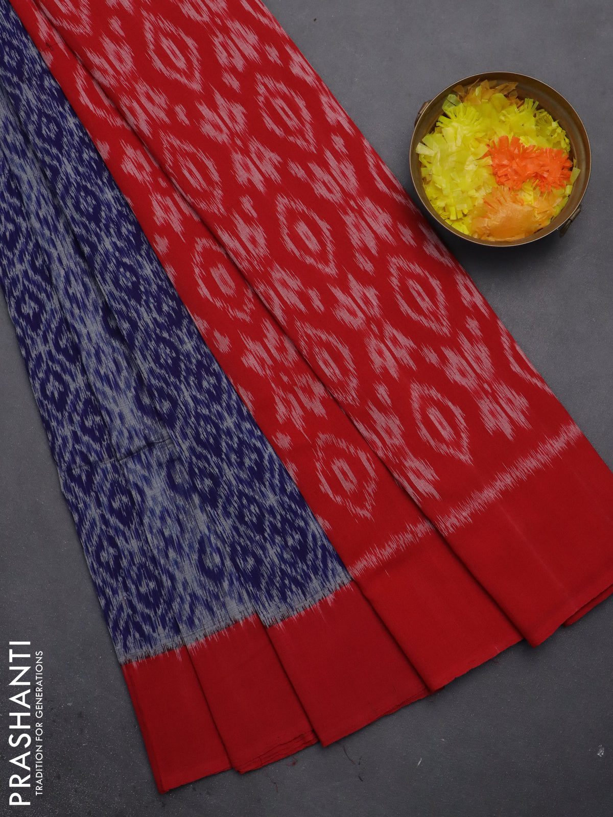 Ikat cotton saree blue and red with allover ikat weaves and long ikat style border