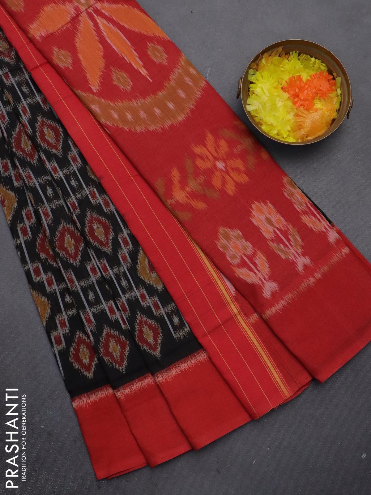 Ikat cotton saree black and red with allover ikat weaves and simple border