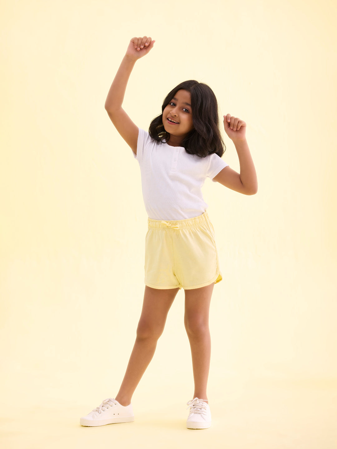 Girls Solid Baby Yellow Mid Rise Knit Shorts