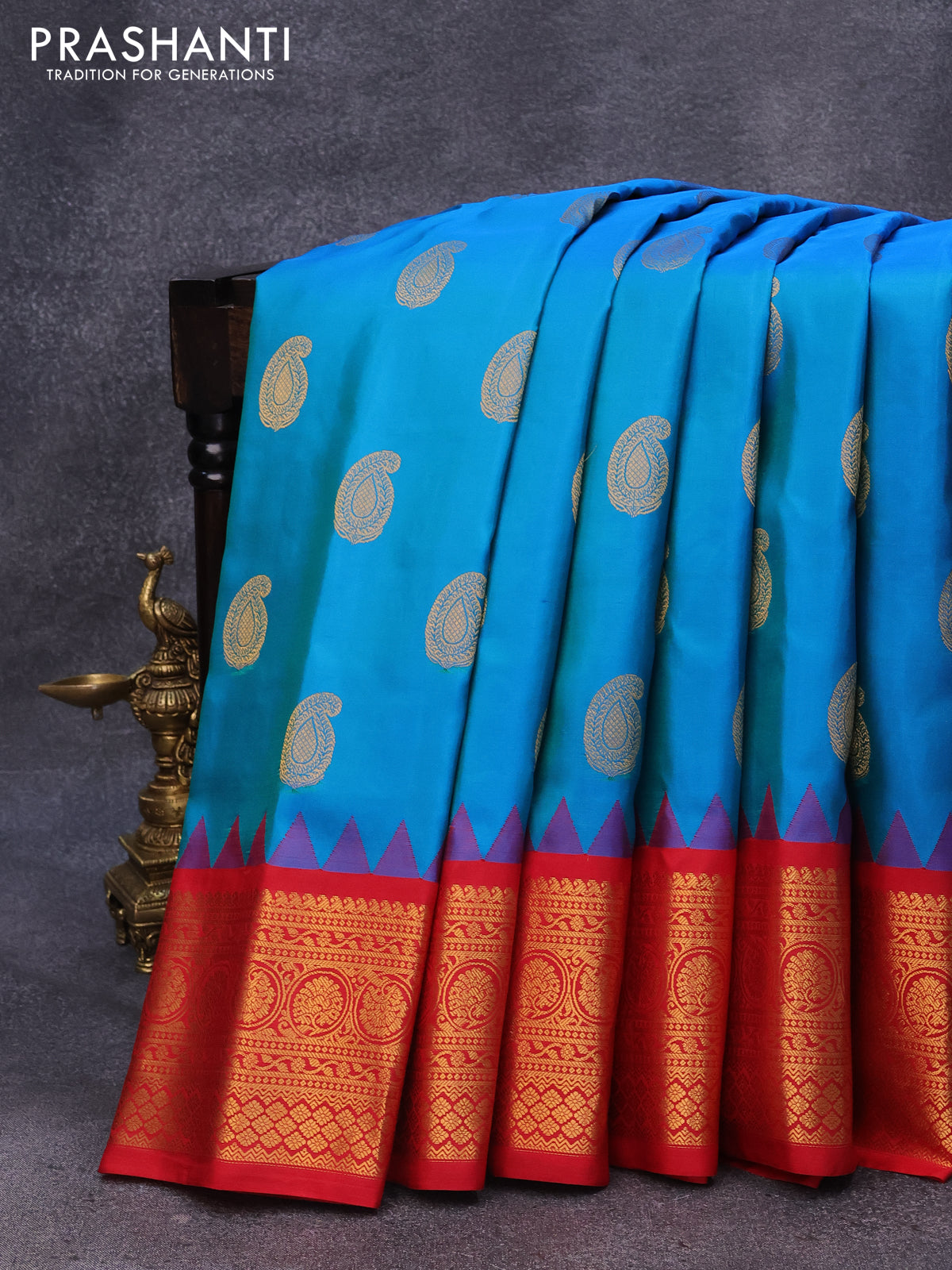 Pure gadwal silk saree dual shade of blue and red with zari woven buttas and zari woven border