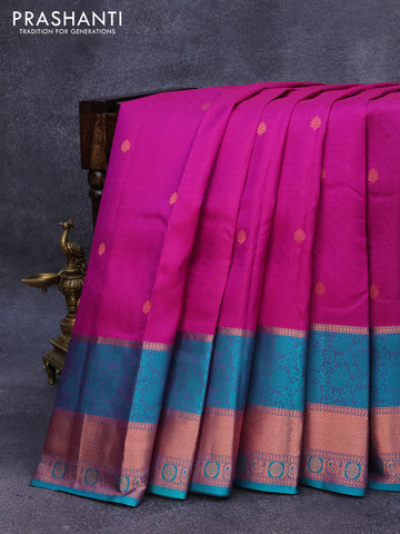 Pure kanjivaram silk saree dual shade of purple and teal green with allover self emboss & zari buttas and copper zari woven border