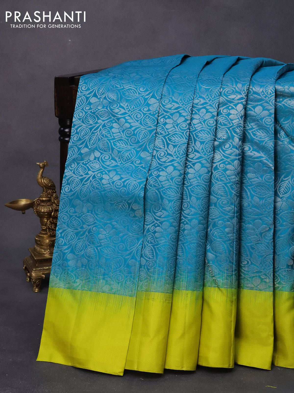 Pure soft silk saree teal blue and lime green with allover silver zari woven brocade weaves and long silver zari woven border