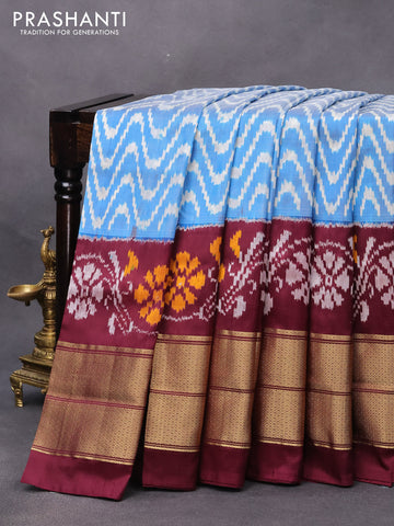 Pochampally silk saree blue and deep maroon with allover ikat weaves and long ikat woven zari border