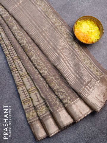 Chanderi silk cotton saree beige shade and grey with natural vegetable prints and zari woven gotapatti lace border