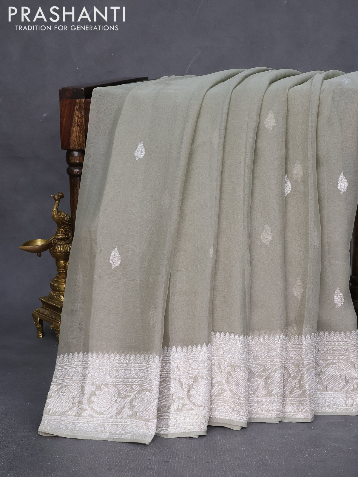 Banarasi chiffon saree grey shade with silver zari woven buttas and silver zari woven border