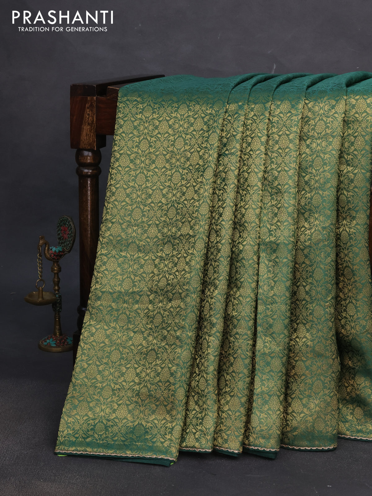 Banarasi semi crepe saree green with allover zari woven brocade weaves and lace work border