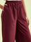 Women Maroon Solid Viscose Knit Mid Rise Palazzos