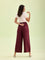 Women Maroon Solid Viscose Knit Mid Rise Palazzos