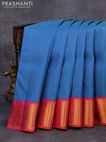 Pure kanjivaram silk saree blue teal blue and dual shade of pinkish orange with allover zari checked pattern and rich zari woven border checks