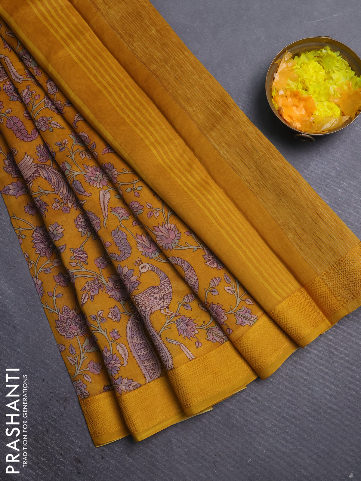 Chanderi silk cotton saree mustard yellow with allover kalamkari prints and woven border