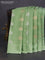 Banarasi mushru silk saree pastel green with allover stripes pattern & zari buttas and satin border