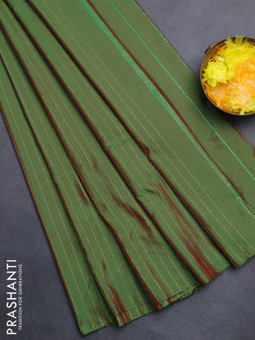 Arani semi silk saree manthulir green with allover silver zari weaves in borderless style